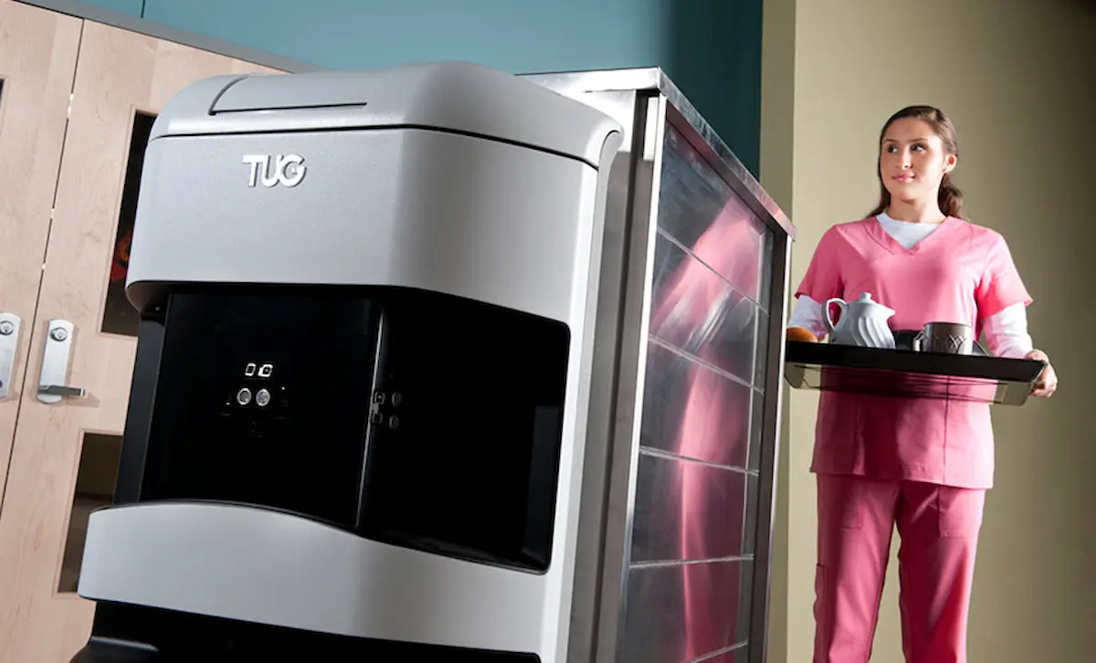 Cận cảnh ma trận cảm biến LiDAR và hệ thống màn hình điều khiển trên cấu trúc phần cứng robot TUG.